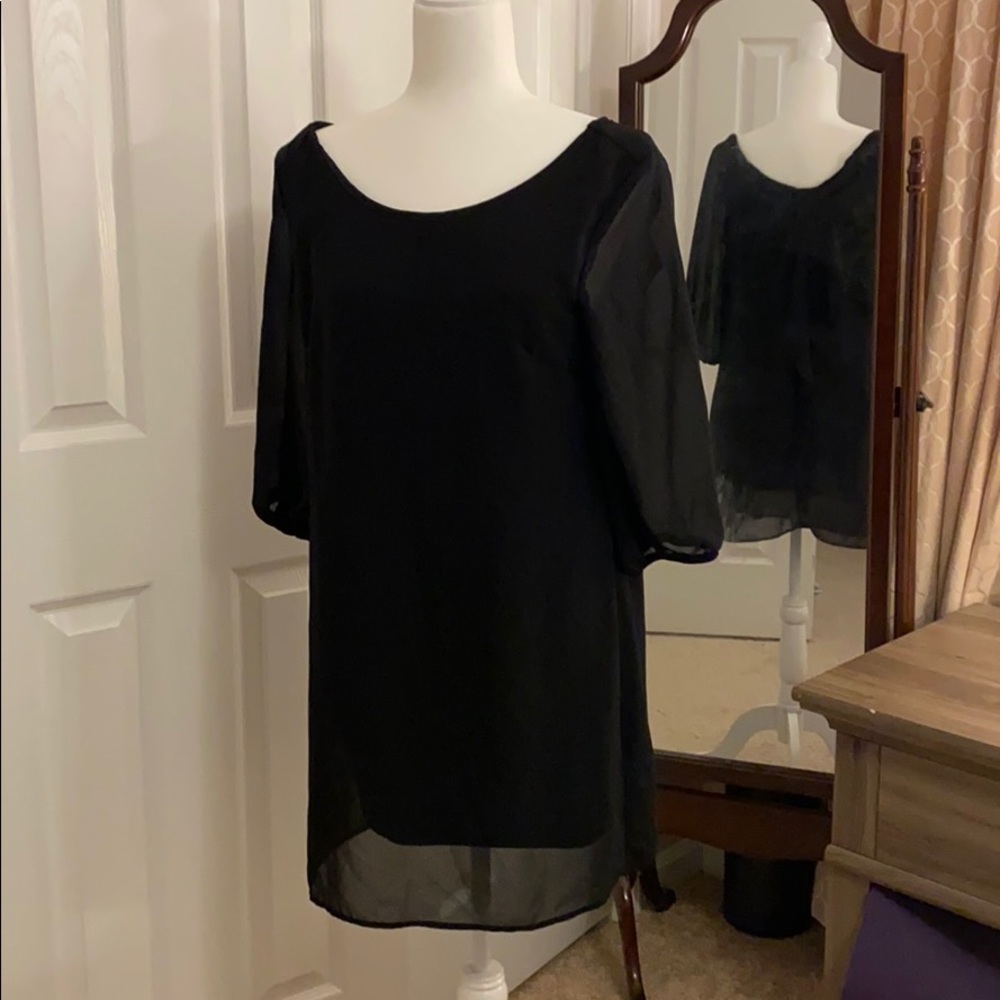 Black bow back dress with sheer arms. Size large